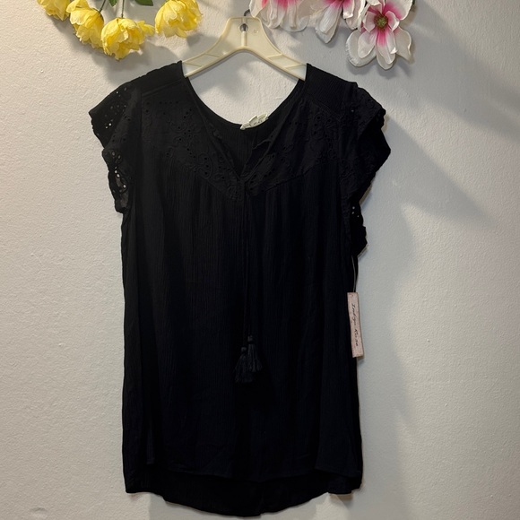 indigo rose Tops - Women’s Black Eyelet Cap-Sleeve Blouse with Tassel Tie